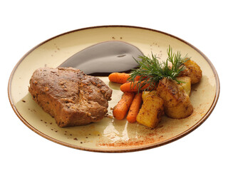 restaurant dish on a plate on a white background: sous vide pork, baked potatoes, carrots, dill, teriyaki sauce, spices. 