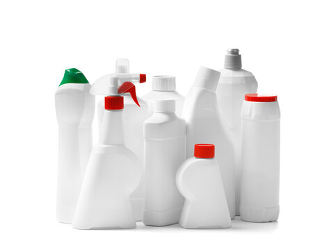 A set of plastic bottles with detergents and cleaners on a white background, household chemicals in packages.
