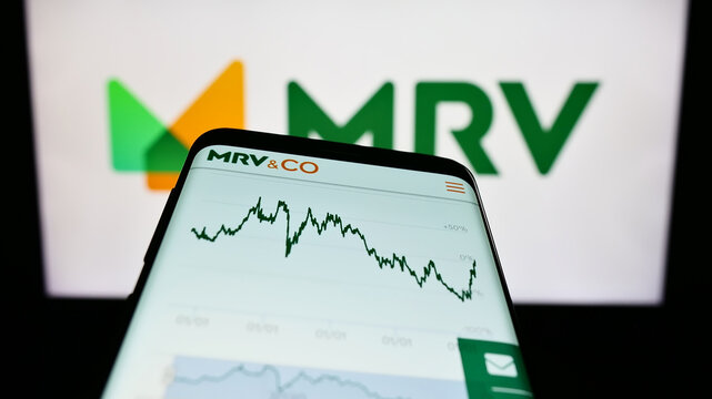 Stuttgart, Germany - 07-26-2023: Mobile phone with webpage of company MRV Engenharia e Participacoes S.A. on screen in front of business logo. Focus on top-left of phone display.