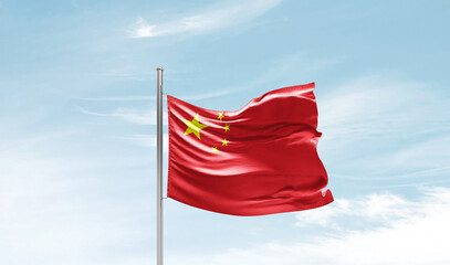 Naklejka na ściany i meble China national flag waving in sky.