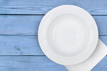 Colored background and empty round plate