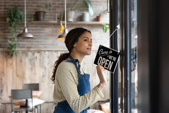 Hispanic store owner opening for business