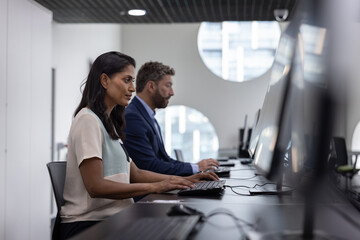 Business executives working in an office on cyber security