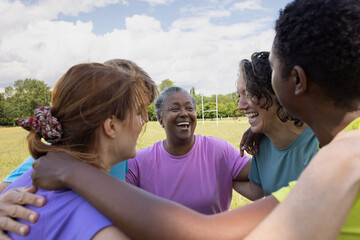 Group of diverse multi generational women doing team sports together