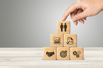 new employee concept. wooden cubes with icons