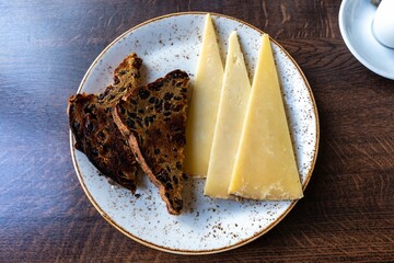 Toasted plum bread and slices of cheese - a simple but delicious lunch