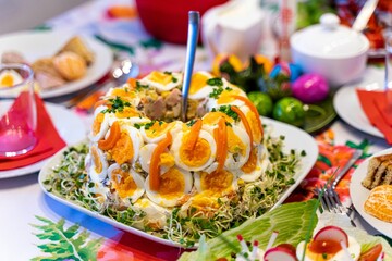 several plates full of food on a table that is set for the holiday