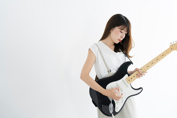 Fototapeta premium ギターを弾く女性