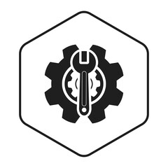 black spanner and cog gear hexagon frame icon