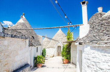 Alberobello old town with white houses and lights.