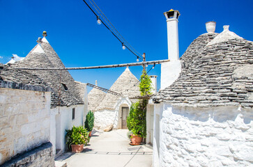 Beautiful Alberobello town with street lamps stock photo