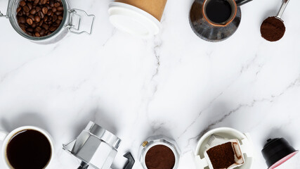 Ingredients for making coffee. Different ways to make coffee geyser moka maker,  metal cezve, coffee machine capsules, drip. Coffee making concept. Flat Lay. Top view. Copy space