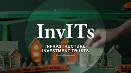 Fototapeta na wymiar InvITs text means infrastructure investment trusts in the foreground. An hand moving a green house model on green and orange mockups. Real estate investment trusts in India. 