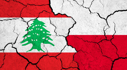 Flags of Lebanon and Poland on cracked surface - politics, relationship concept