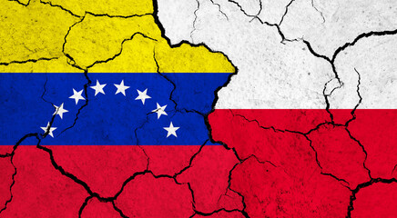 Flags of Venezuela and Poland on cracked surface - politics, relationship concept