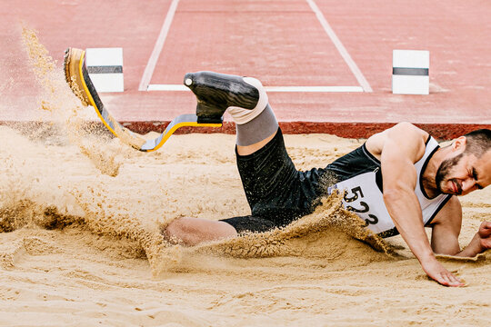 para athlete long jump, landing sand in athletics competition, summer sports games