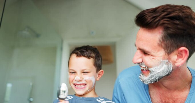 Laughing, shaving and a father teaching his son about grooming or hygiene in the bathroom of their home together. Face, family and kids with a boy learning how to shave with his playful single parent