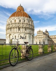 Bicycle in front of Pisa Basilica - obrazy, fototapety, plakaty