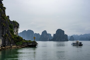 Aerial view of a cruise ship navigating through Halong Bay in Vietnam, Southeast Asia