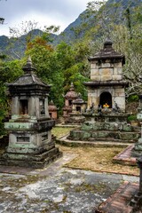 Asian Buddhist Temple and Shrine in Northeast Vietnam with Mountains in the Background