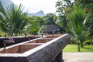 The sink and multi-taps are outdoors.