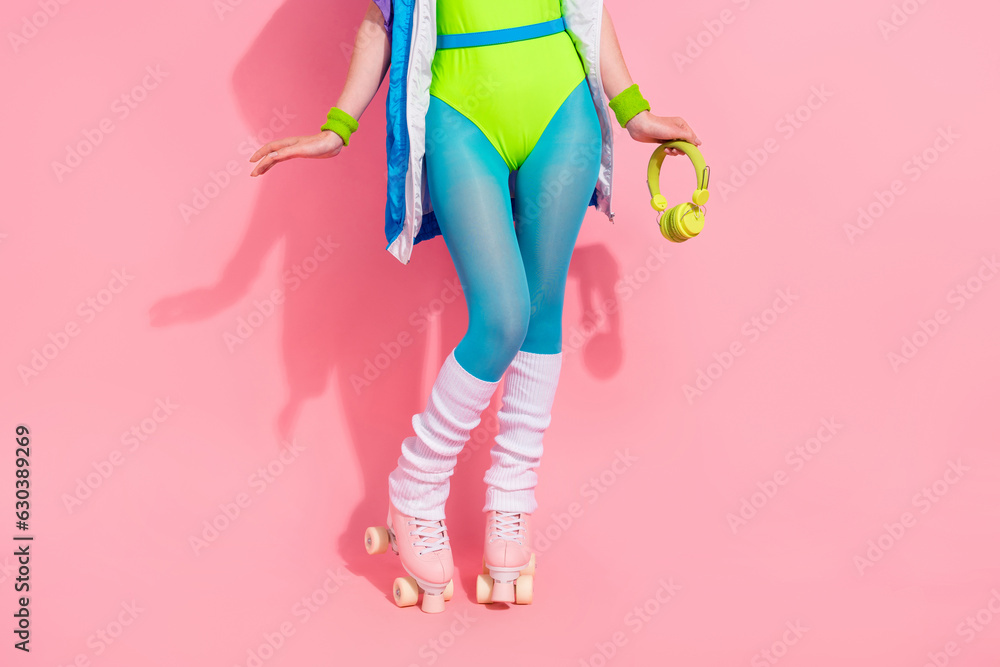 Poster Cropped photo of sporty person in 70s outfit bodysuit ride roller skates with headset sport songs isolated pastel color background