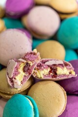 Delicious assortment of colorful macarons presented in a white bowl