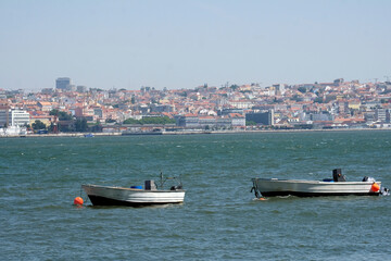 Two boats on the water in Lisbon, Portugal
