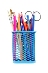 Colored pencils and various school supplies in a metal holder or cup. Isolated from the background