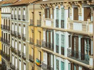 Scenic view of beautiful colorful residential buildings with balconies