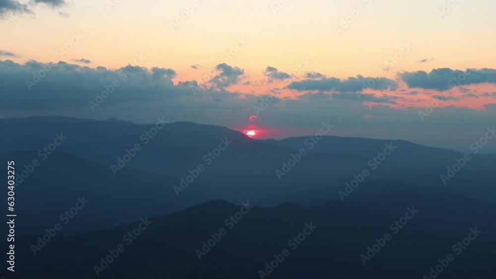 Poster Landscape  scene of clouds in a hazy sky at sunset, for wallpaper