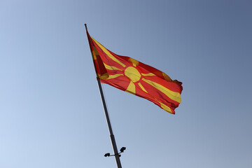 The flag of North Macedonia on sky