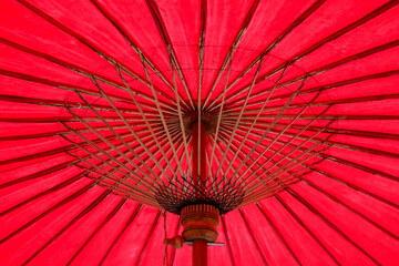 Under view of the red bamboo umbrella