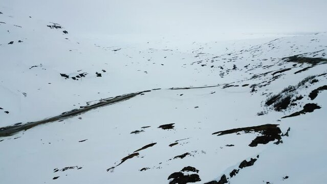 4K drone video of snowy Norwegian mountain landscape in Myrkdalen, Norway.