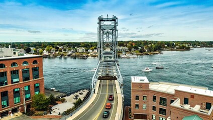 Aerial view of a historic bridge over the water in Portsmouth, New Hampshire