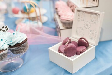 High-resolution close-up image of an assortment of delicious French-style macarons in a box