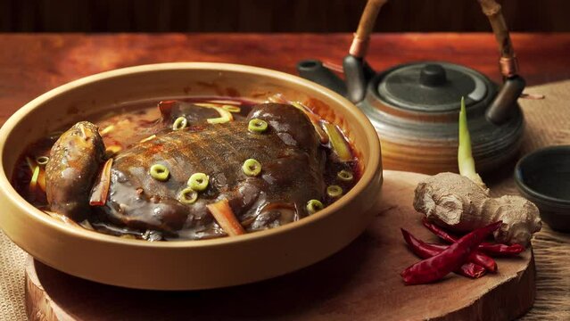 Special Chinese cuisine Braised soft-shelled turtle with scallions