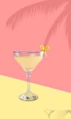 Glass of delicious alcohol cocktail on desk