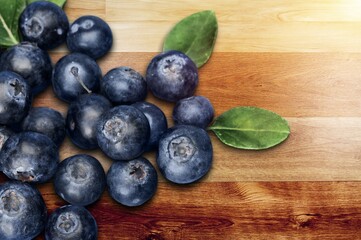 Fresh ripe blueberry with green  leaves
