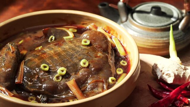 Special Chinese cuisine Braised soft-shelled turtle with scallions