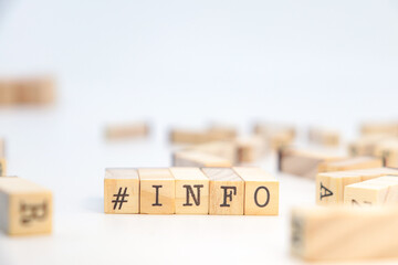 word INFO on wooden cubes. business concept