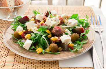 Fresh vegetarian healthy vegetable salad with arugula and chees