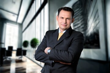 Fototapeta premium Happy business man standing in office, AI generated image