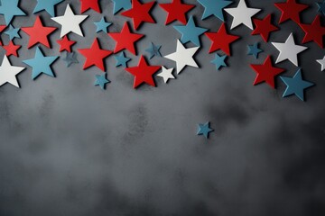 Five-pointed stars of american flag colors on gray light cement background. Patriot's Day. free space for text For your design.