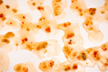 Red jam splashes isolated on a white background.