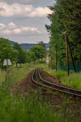 Railway tracks in summer cloudy day near Neudorf in Germany