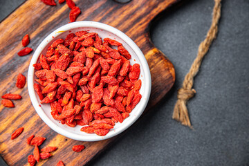 Goji berries delicious food supplement vegetable food healthy meal food snack on the table copy space food background rustic top view keto or paleo diet