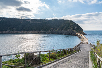 Scenic landscape of Procida with the bridge connecting with Vivara island, Campania, Italy