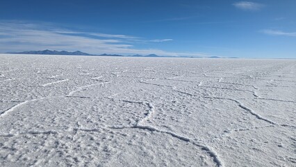 Fototapeta na wymiar Salt desert of Uyuni with salt texture