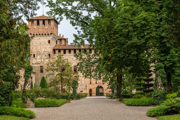 Fototapeta na wymiar The beautiful castle of Grazzano Visconti, surrounded by gardens, Emilia-Romagna, Italy